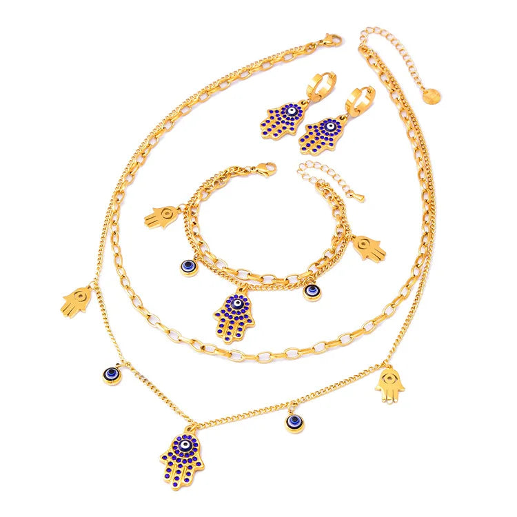 Luxury 18K Gold Blue Zircon Eye Jewelry Set – Double Chain Necklace, Bracelet & Earrings for Women Sylviane