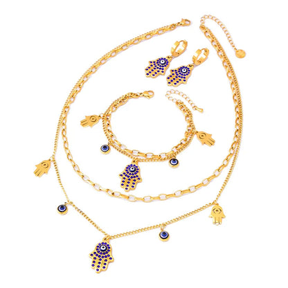 Luxury 18K Gold Blue Zircon Eye Jewelry Set – Double Chain Necklace, Bracelet & Earrings for Women Sylviane