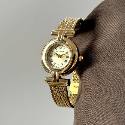 Vintage Roman Dial Women’s Watch – Elegant Gold Stainless Steel Strap | Classic Quartz Antique‑Style Timepiece Diana