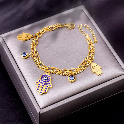 Luxury 18K Gold Blue Zircon Eye Jewelry Set – Double Chain Necklace, Bracelet & Earrings for Women Sylviane