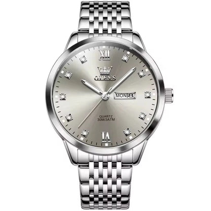 OLEVS 2943 Fashion Quartz Watch – Stainless Steel Band, Round Dial, Week Display & Calendar