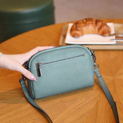 Women’s Genuine Leather Messenger Bag: Retro Togo Cowhide Mini Handbag for Ladies Norah