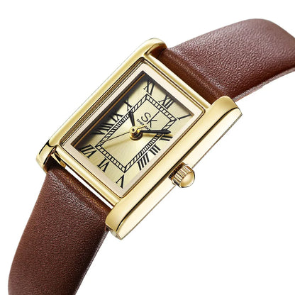 SHENGKE Roman Dial Quartz Watch for Women – Retro Leather Band Style Anaya