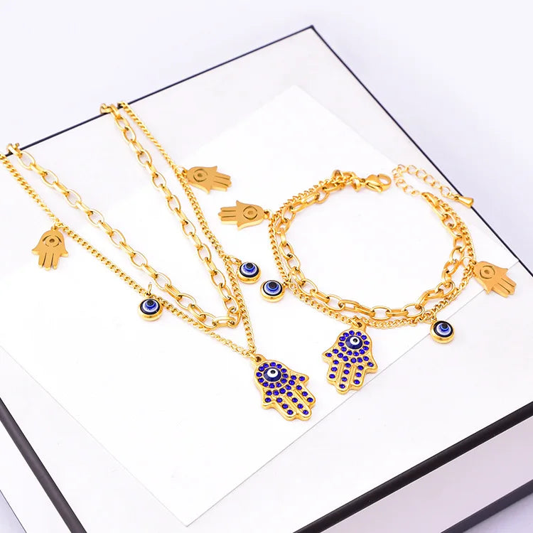 Luxury 18K Gold Blue Zircon Eye Jewelry Set – Double Chain Necklace, Bracelet & Earrings for Women Sylviane