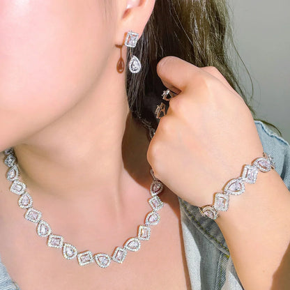 Silver Water Drop Cubic Zirconia Jewelry Set – 4pcs Ring, Bracelet, Earrings & Necklace | Luxury Accessories for Women Angelique